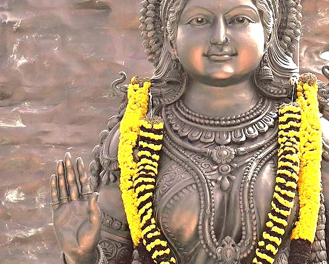 A deity statue with a garland at Vidhajna Soudha in Bangalore, Karnataka, India, a site near Tipu Sultan Palace ('Tiger of Mysore') for tourists visiting near Mysore Palace. A deity statue with a garland at Vidhajna Soudha in Bangalore, Karnataka, India, a site near Tipu Sultan Palace ('Tiger of Mysore') for tourists visiting near Mysore Palace.