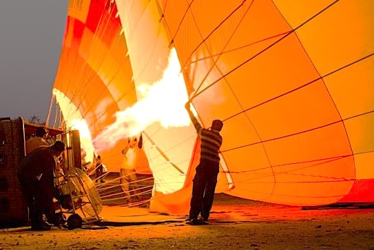 "Witness the fiery inflation preparation for hot air ballooning in Agra, India, an exhilarating start to viewing the UNESCO Taj Mahal near the famous sanctuary of Keoladeo National Park." "Witness the fiery inflation preparation for hot air ballooning in Agra, India, an exhilarating start to viewing the UNESCO Taj Mahal near the famous sanctuary of Keoladeo National Park."
