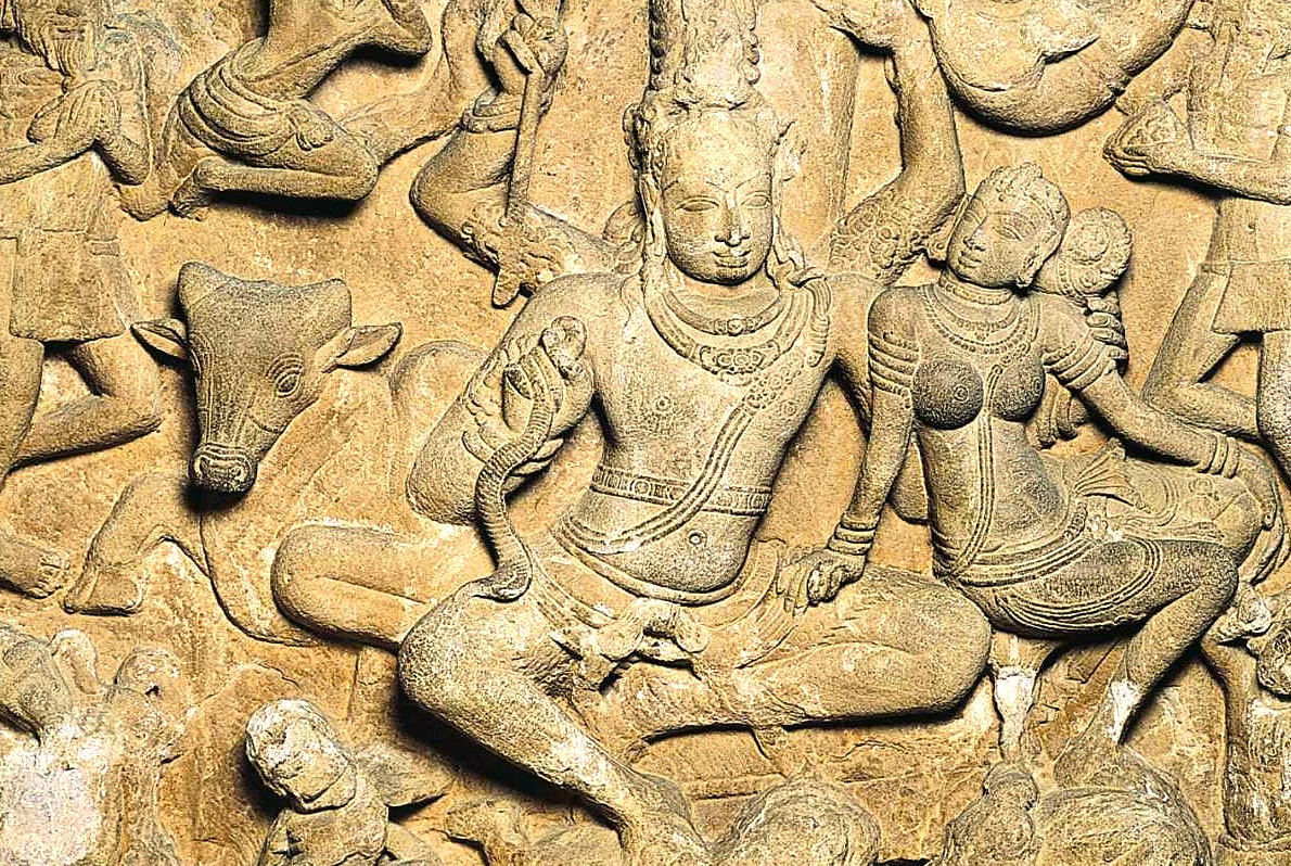 Intricate stone relief carving of a Hindu deity, possibly Shiva, at Aihole, India, showcasing ancient art from the heritage sites near Badami and the Pattadakal UNESCO temples. Intricate stone relief carving of a Hindu deity, possibly Shiva, at Aihole, India, showcasing ancient art from the heritage sites near Badami and the Pattadakal UNESCO temples.