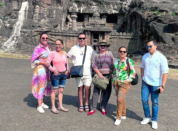 Tourists exploring Maharashtra’s Aurangabad UNESCO heritage site of Elora and Ajanta Caves in India marvel at ancient rock-cut architecture, intricate carvings, cultural legacy, and serene ambience amidst historic Buddhist wonders.