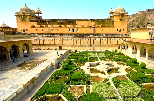 Explore India’s UNESCO Heritage Amber Fort in Jaipur, Rajasthan, a majestic hilltop fortress showcasing intricate Rajasthani and Mughal architecture, lush symmetrical gardens, historic palace courtyards, rich cultural heritage tourism landmark. Explore India’s UNESCO Heritage Amber Fort in Jaipur, Rajasthan, a majestic hilltop fortress showcasing intricate Rajasthani and Mughal architecture, lush symmetrical gardens, historic palace courtyards, rich cultural heritage tourism landmark.
