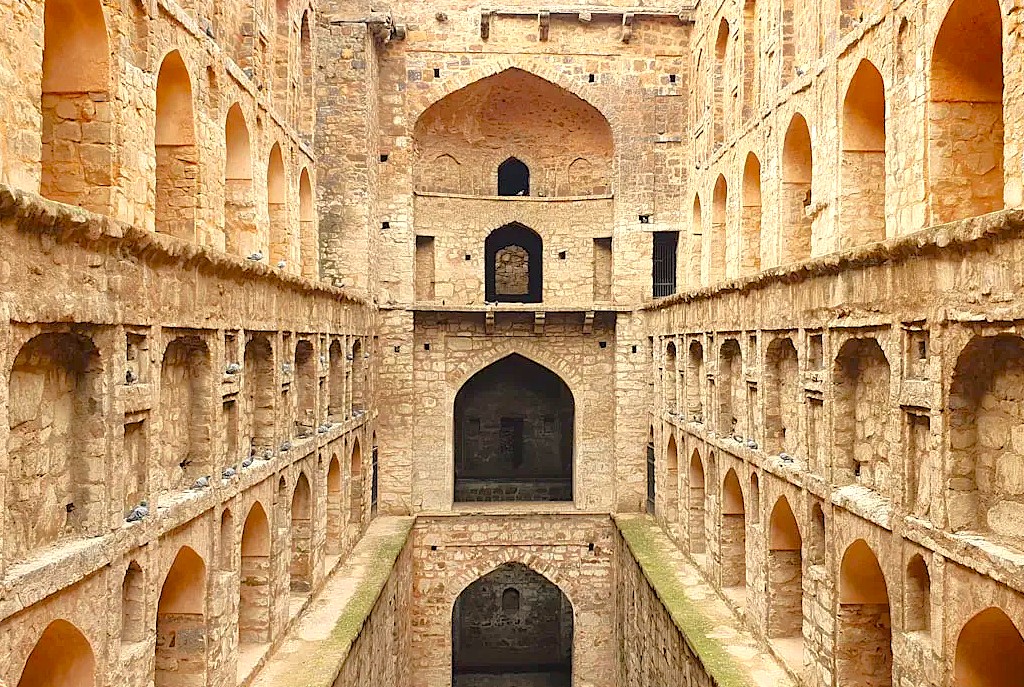Discover the geometric depths of this Delhi stepwell, a hidden contrast to the Unesco Red Fort, Qutb Minar, and India Gate on your India travel from Unesco Ellora caves to Varanasi Discover the geometric depths of this Delhi stepwell, a hidden contrast to the Unesco Red Fort, Qutb Minar, and India Gate on your India travel from Unesco Ellora caves to Varanasi