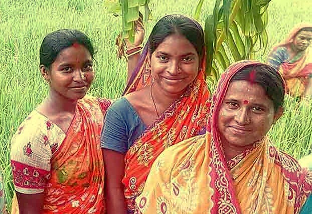 The welcoming faces of local women in the vibrant Anegundi Rice Fields of Karnataka, India, reflect the living culture thriving near the Hampi UNESCO site, a historic area famous for architectural marvels such as the Queen's Baths, the iconic Vittala Temple, and the majestic Elephant Stables. The welcoming faces of local women in the vibrant Anegundi Rice Fields of Karnataka, India, reflect the living culture thriving near the Hampi UNESCO site, a historic area famous for architectural marvels such as the Queen's Baths, the iconic Vittala Temple, and the majestic Elephant Stables.