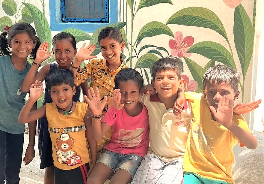The cheerful, waving children of Anegundi Village in Karnataka, India, represent the vibrant local life that flourishes around the Hampi UNESCO site. This historic region is celebrated for its incredible architectural heritage, including the Queen's Baths, the iconic Vittala Temple, and the majestic Elephant Stables. The cheerful, waving children of Anegundi Village in Karnataka, India, represent the vibrant local life that flourishes around the Hampi UNESCO site. This historic region is celebrated for its incredible architectural heritage, including the Queen's Baths, the iconic Vittala Temple, and the majestic Elephant Stables.