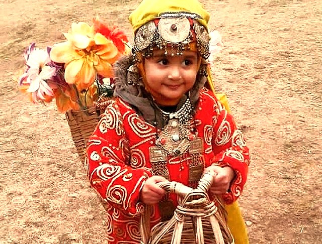 "Portrait of a Kashmiri child in traditional dress, symbolizing the vibrant local culture found near Srinagar and attractions like Dachigam National Park." "Portrait of a Kashmiri child in traditional dress, symbolizing the vibrant local culture found near Srinagar and attractions like Dachigam National Park."
