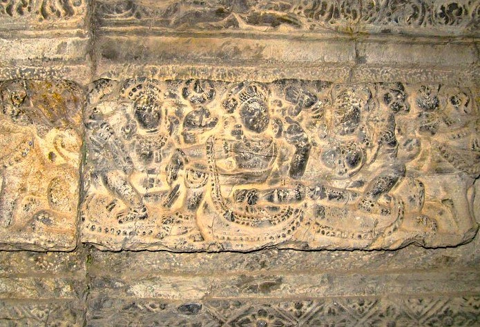 Detailed bas-relief stone carving at the Avantiswami Temple in Jammu and Kashmir, an ancient archaeological site near Srinagar, saffron fields, Aru Valley, and Betaab Valley. Detailed bas-relief stone carving at the Avantiswami Temple in Jammu and Kashmir, an ancient archaeological site near Srinagar, saffron fields, Aru Valley, and Betaab Valley.