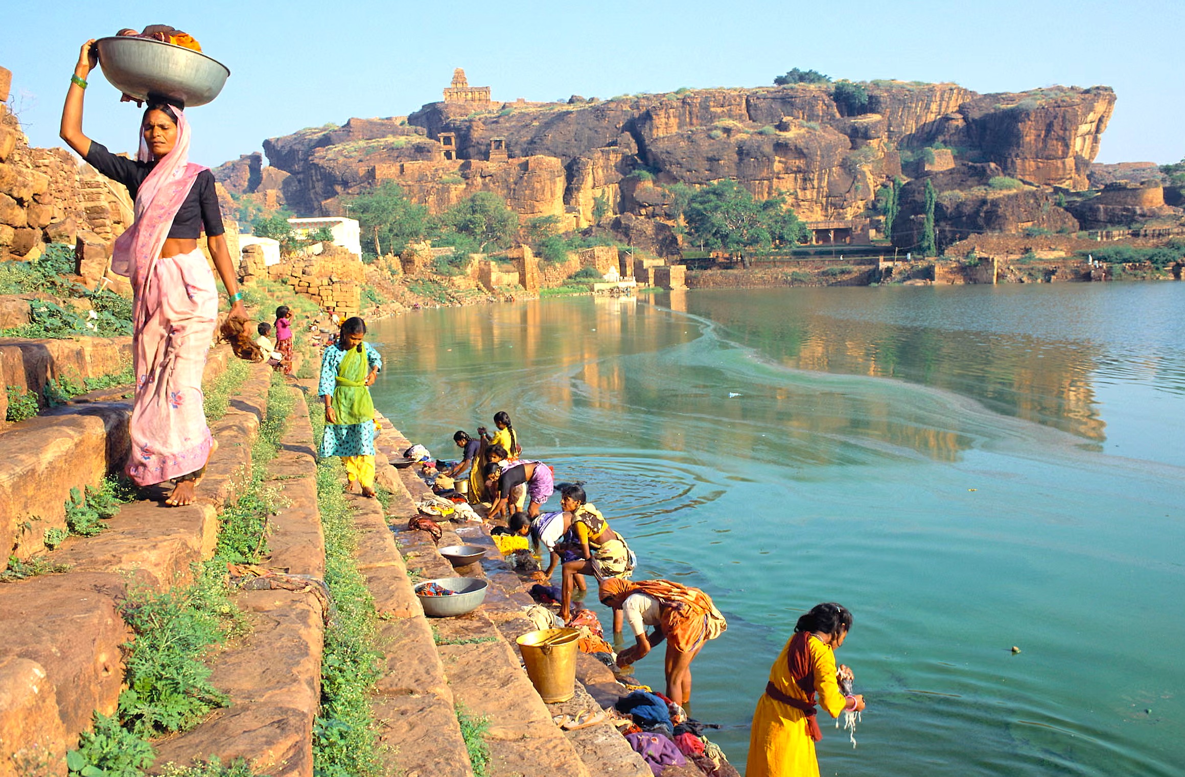 Badami offers ample opportunities for photography, from its stunning sandstone formations to the intricately carved temples. Unique features, such as the reflections of ancient temple structures in the serene waters, create picturesque moments for us. These scenes allow us to capture the very essence of this rich and compelling history. We easily find many diverse and beautiful subjects to photograph in this special place. The ancient architecture stands majestically against the natural rock formations and vibrant sky. Every turn reveals another striking view, waiting to be captured through a lens. These detailed carvings tell stories of a distant and significant past for all to observe. We discover captivating vistas and unique perspectives everywhere we look around. The interplay of natural light and shadow highlights the textures perfectly for our enjoyment. This entire location provides endless inspiration for creative visual expression during our visit. It is a rewarding experience for anyone seeking to document its enduring charm.