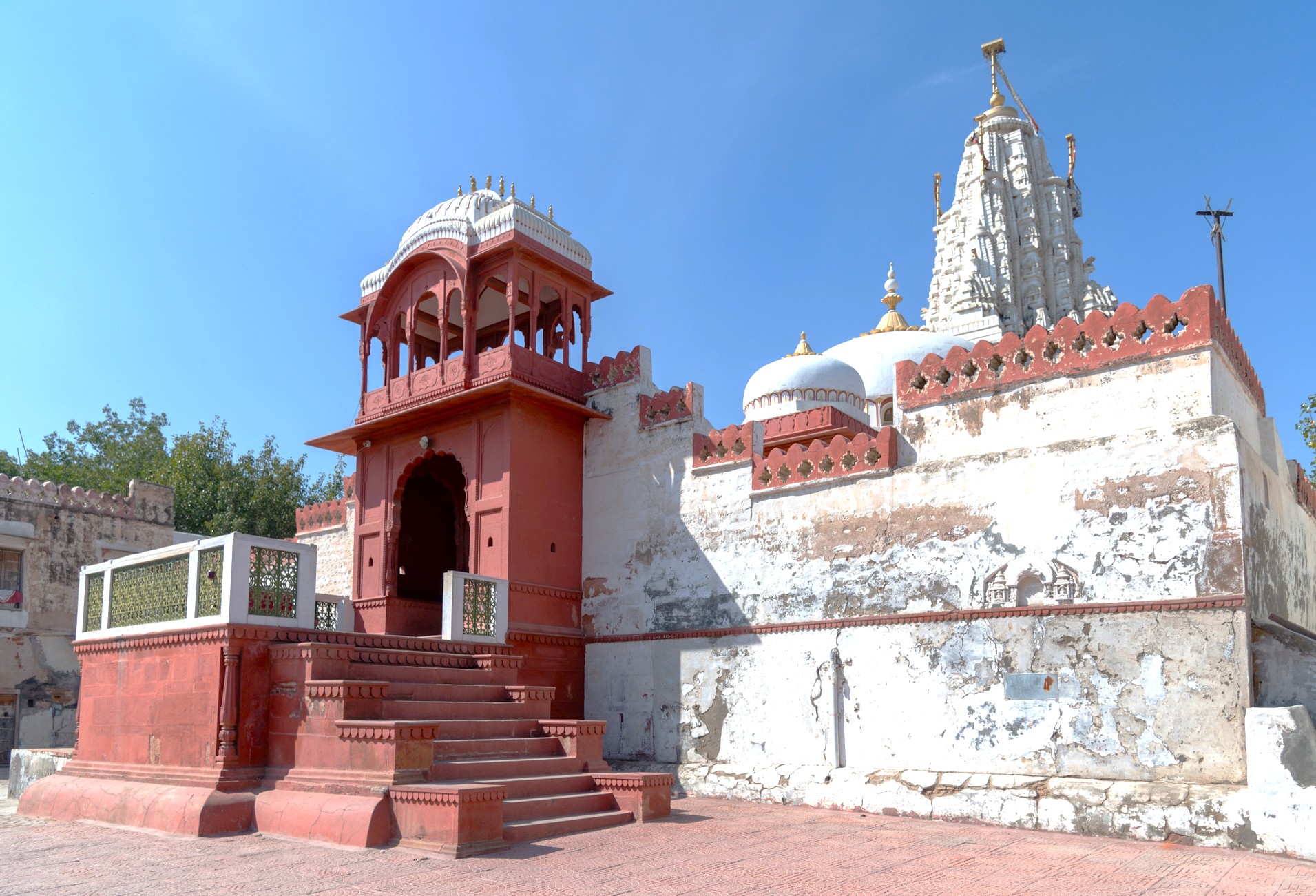 “Inside Bhandasar Jain Temple in Bikaner, Rajasthan, India, vibrant frescoes, intricately carved wooden statues, floral motifs, and ornate pillars reflect the cultural craftsmanship and pilgrimage atmosphere amid the Thar Desert.” “Inside Bhandasar Jain Temple in Bikaner, Rajasthan, India, vibrant frescoes, intricately carved wooden statues, floral motifs, and ornate pillars reflect the cultural craftsmanship and pilgrimage atmosphere amid the Thar Desert.”