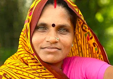 A striking portrait of a local woman with light eyes, wearing a traditional colorful sari and bindi, represents the vibrant culture of Badami, Karnataka, India. This region, home to the Bhuthanatha Temple, Agastya Lake, and Badami Cave Temples, is a major heritage destination near the Pattadakal UNESCO World Heritage site. A striking portrait of a local woman with light eyes, wearing a traditional colorful sari and bindi, represents the vibrant culture of Badami, Karnataka, India. This region, home to the Bhuthanatha Temple, Agastya Lake, and Badami Cave Temples, is a major heritage destination near the Pattadakal UNESCO World Heritage site.