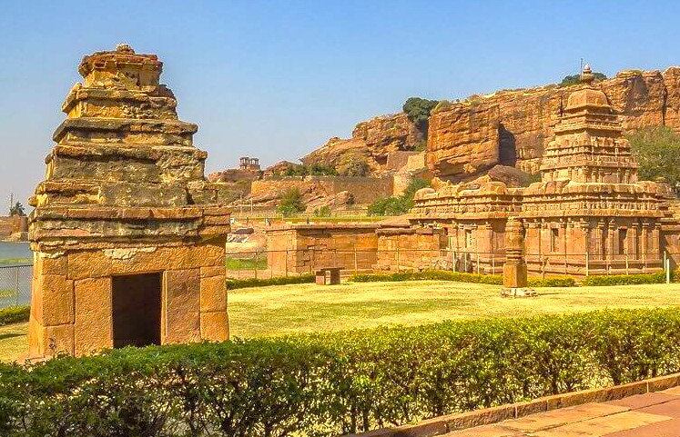 Here is an SEO-optimized sentence based on your request:  A scenic view highlights the ancient Bhuthanatha Temple complex, a stone marvel of Chalukyan architecture, situated on the banks of the sacred Agastya Lake in Badami, Karnataka, India. This major heritage destination, part of the Badami Cave Temples area, is located near the Pattadakal UNESCO World Heritage site. Here is an SEO-optimized sentence based on your request:  A scenic view highlights the ancient Bhuthanatha Temple complex, a stone marvel of Chalukyan architecture, situated on the banks of the sacred Agastya Lake in Badami, Karnataka, India. This major heritage destination, part of the Badami Cave Temples area, is located near the Pattadakal UNESCO World Heritage site.