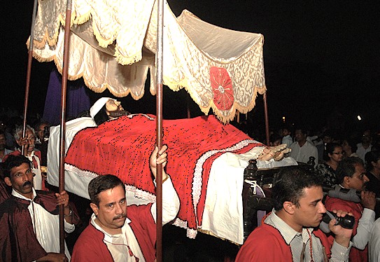 Devotees carry the sacred relics of St. Francis Xavier in a procession at the Bom Jesus Basilica, a major Old Goa Unesco church in Goa, India.