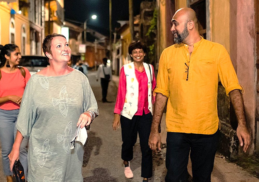 Diverse tourists on a night tour in Hubli, Karnataka, India, a stop near Agadi Thota Village and Chandramouli Temple on the way to Old Goa Unesco churches. Diverse tourists on a night tour in Hubli, Karnataka, India, a stop near Agadi Thota Village and Chandramouli Temple on the way to Old Goa Unesco churches.