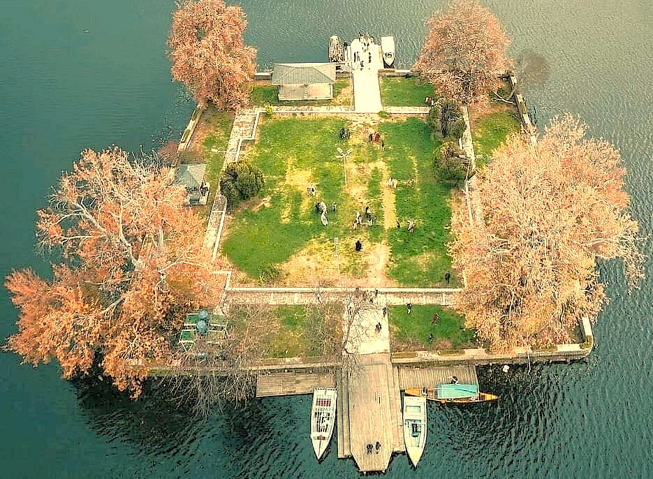 Aerial view of the iconic Char Chinar island on Dal Lake, a top tourist destination near Chinar Bagh Ghat in Srinagar, Jammu and Kashmir, India.