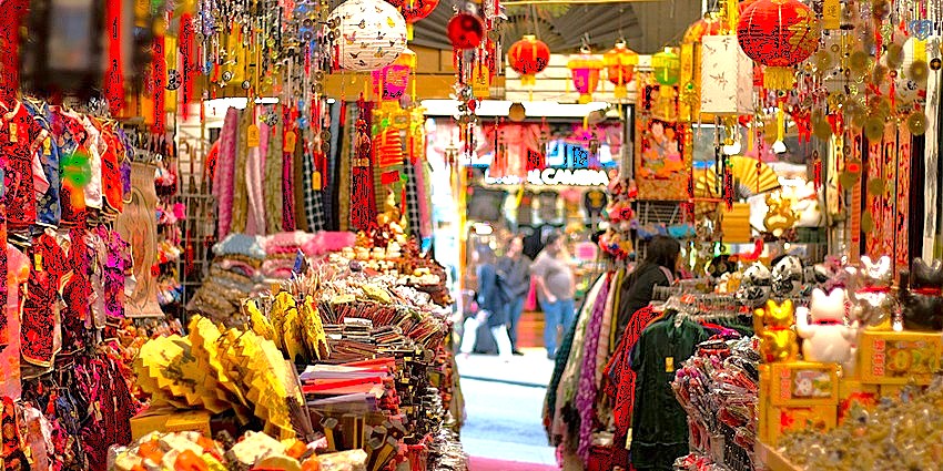 Vibrant bazaar stalls at Town Hall Market in Coimbatore, Tamil Nadu, India, showcasing colorful textiles, spices, handcrafted souvenirs and lively vendors, South Indian shopping experience. Vibrant bazaar stalls at Town Hall Market in Coimbatore, Tamil Nadu, India, showcasing colorful textiles, spices, handcrafted souvenirs and lively vendors, South Indian shopping experience.