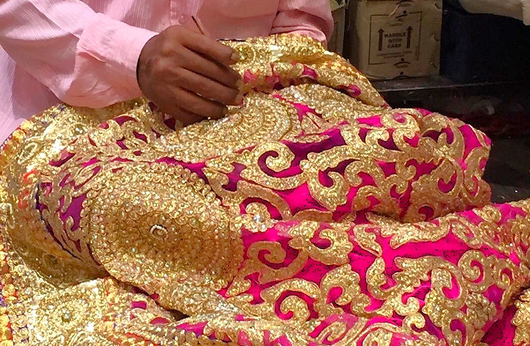 Discover premium silk shops on Bangalore Commercial Street in Karnataka, India, offering authentic Mysore silk sarees, handcrafted luxurious gold embroidery, traditional artisanal craftsmanship, vibrant textiles.