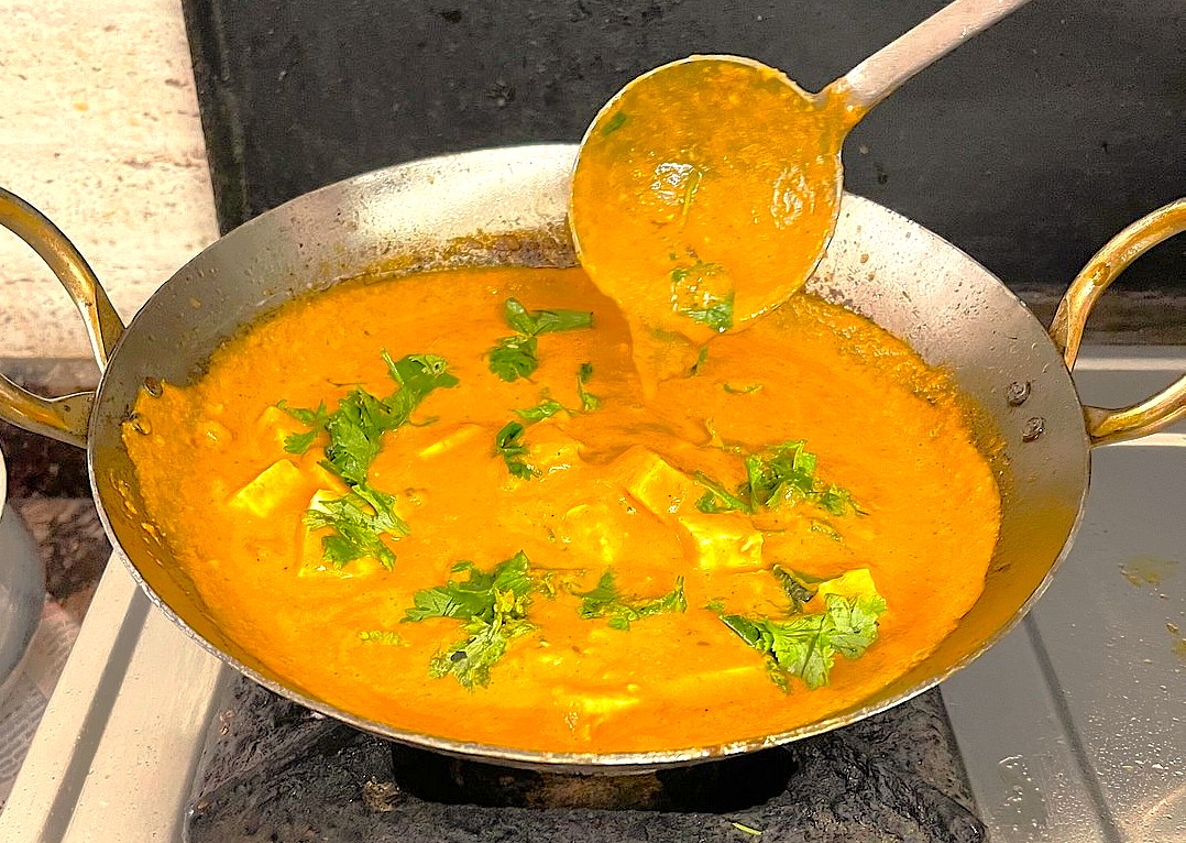 Road trippers from Mysore Palace embark on an adventure at cooking classes in Coimbatore, Tamil Nadu near Isha Temple, India, mastering authentic curry techniques with vibrant fragrant spices and cilantro. Road trippers from Mysore Palace embark on an adventure at cooking classes in Coimbatore, Tamil Nadu near Isha Temple, India, mastering authentic curry techniques with vibrant fragrant spices and cilantro.