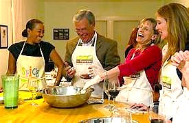 A group of tourists share a joyful moment during a hands-on Indian cooking class in Coimbatore, Tamil Nadu, India. This fun cultural activity is a popular experience for travelers visiting the region, including the famous nearby hill stations of Kodaikanal and Ooty. A group of tourists share a joyful moment during a hands-on Indian cooking class in Coimbatore, Tamil Nadu, India. This fun cultural activity is a popular experience for travelers visiting the region, including the famous nearby hill stations of Kodaikanal and Ooty.