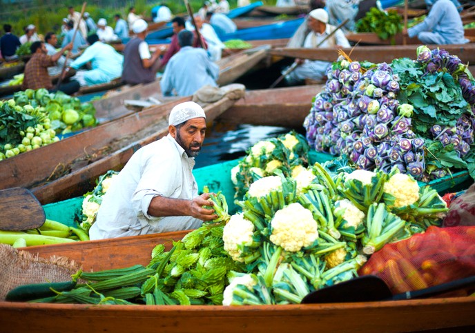 The floating vegetable market on Dhal Lake in Srinagar, Jammu and Kashmir, a unique sight near the Light and Sound show, saffron fields, Aru Valley, and Betaab Valley.