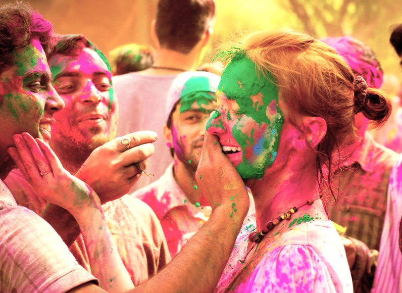 Experience vibrant Holi celebrations in India – New Delhi, where locals and visitors throw multicolored powders, embrace cultural heritage, ignite community spirit, enjoy vivid colors, festive traditions, and shared