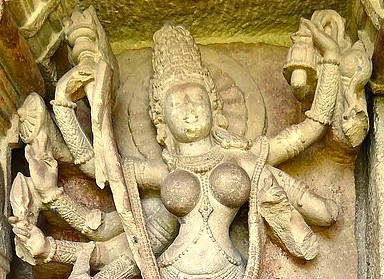 Close-up of a detailed stone carving of the goddess Durga at the Aihole Durga Temple, India, a key heritage site near Badami and Pattadakal UNESCO temples. Close-up of a detailed stone carving of the goddess Durga at the Aihole Durga Temple, India, a key heritage site near Badami and Pattadakal UNESCO temples.