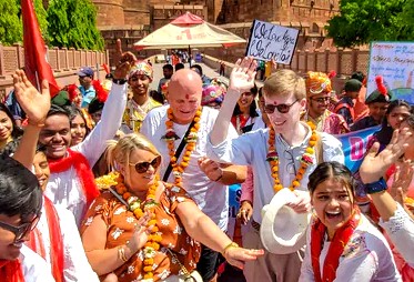 Tourists receive a warm, celebratory welcome with garlands at the Aihole Durga Temple, India, a key heritage site near Badami and the Pattadakal UNESCO temples. Tourists receive a warm, celebratory welcome with garlands at the Aihole Durga Temple, India, a key heritage site near Badami and the Pattadakal UNESCO temples.