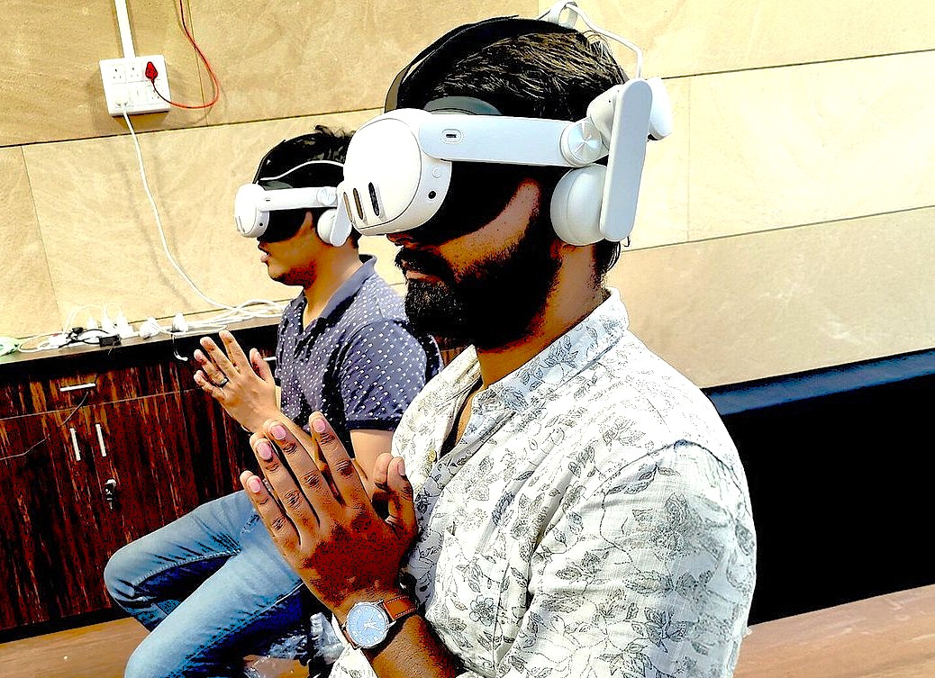 Two men forge a deep spiritual relationship through a VR experience at the Durlabh Darshan Kendra in Varanasi, Uttar Pradesh, India, near the Sarnath UNESCO site. Two men forge a deep spiritual relationship through a VR experience at the Durlabh Darshan Kendra in Varanasi, Uttar Pradesh, India, near the Sarnath UNESCO site.