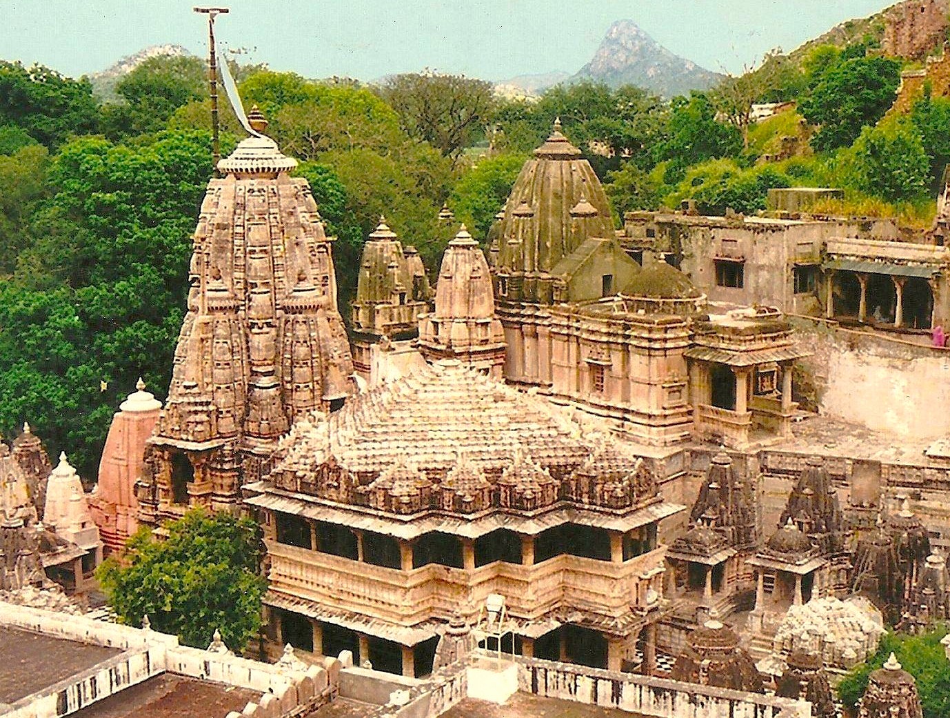 Discover the majestic Sri Elkingi Temple perched near Udaipur in Rajasthan, India, featuring intricately carved stone shrines, lush hilltop surroundings, ancient Hindu architecture, cultural heritage, and tranquil panoramic mountain vistas. Discover the majestic Sri Elkingi Temple perched near Udaipur in Rajasthan, India, featuring intricately carved stone shrines, lush hilltop surroundings, ancient Hindu architecture, cultural heritage, and tranquil panoramic mountain vistas.