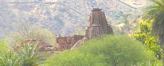 Visitors admire the ancient Sri Elkingi Temple nestled in Udaipur’s lush hills of Rajasthan, India, where intricately carved stone structures blend with green surroundings, inviting exploration of rich local heritage. Visitors admire the ancient Sri Elkingi Temple nestled in Udaipur’s lush hills of Rajasthan, India, where intricately carved stone structures blend with green surroundings, inviting exploration of rich local heritage.