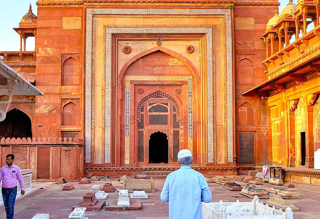 “Rajasthan Fatehpur Sikri Agra India’s historic Mughal-era local tombs display intricately carved red sandstone facades, latticed jali screens, and visitors admiring UNESCO heritage monument significance.” “Rajasthan Fatehpur Sikri Agra India’s historic Mughal-era local tombs display intricately carved red sandstone facades, latticed jali screens, and visitors admiring UNESCO heritage monument significance.”