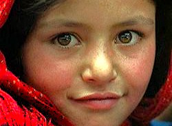 A captivating close-up portrait of a local Kashmiri child seen near the Floating Market, a famous travel destination in Srinagar, Jammu and Kashmir, India.