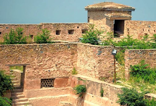 Close-up of the ancient stone ramparts and watchtower architecture inside Hari Parbat Fort, a historic landmark for tourists in Srinagar, Jammu and Kashmir, India.