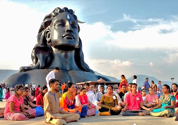“Group meditation at the base of the massive Adiyogi Shiva statue at Isha Temple in Coimbatore Tamil Nadu, India, unites devotees in serene spiritual practice.” “Group meditation at the base of the massive Adiyogi Shiva statue at Isha Temple in Coimbatore Tamil Nadu, India, unites devotees in serene spiritual practice.”