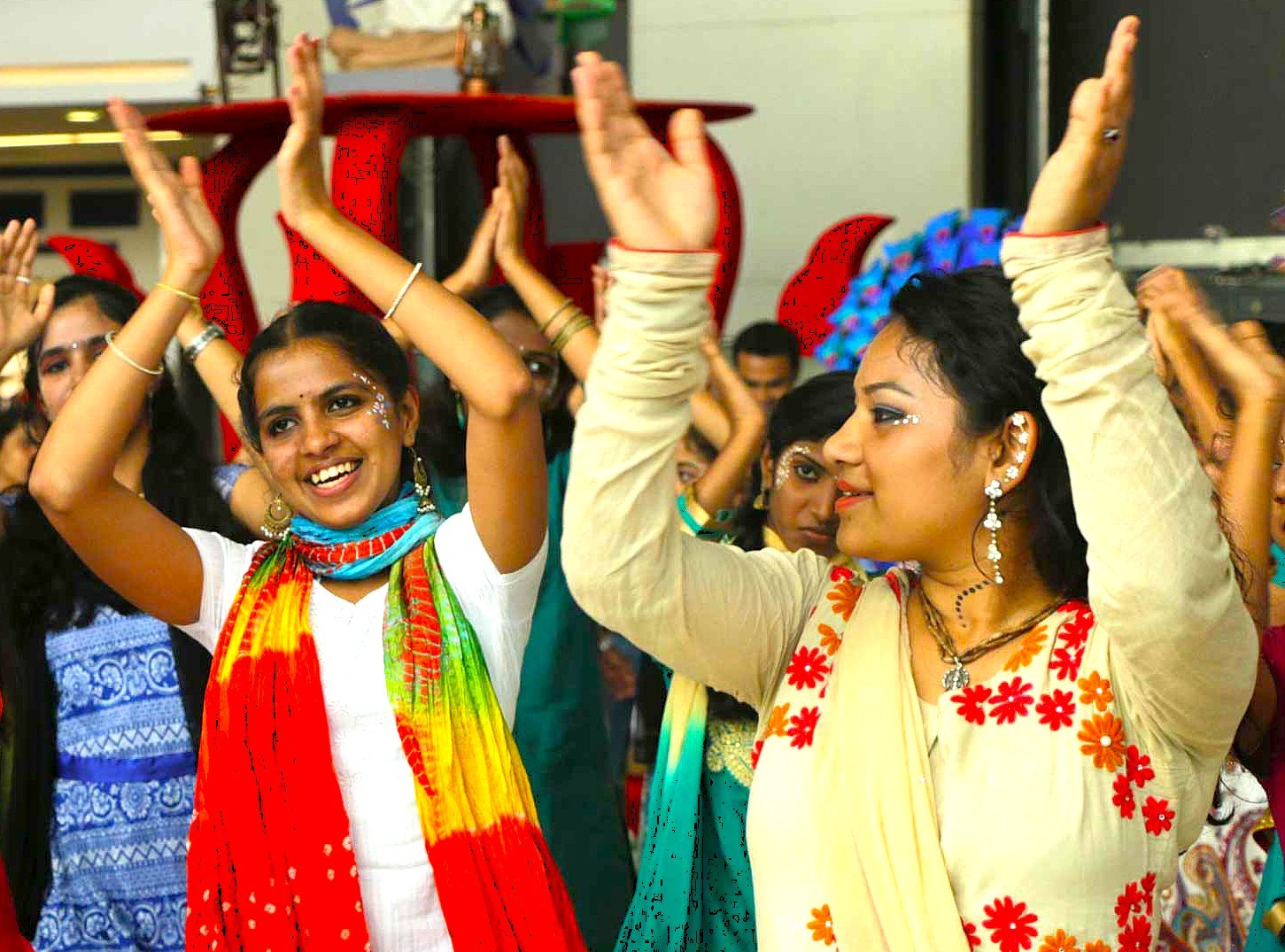 Joyful devotees perform traditional dance inside vibrant ISKCON Temple in Bangalore Karnataka, India, celebrating spiritual unity, cultural heritage, rhythmic movements, colorful attire, community devotion, energy. Joyful devotees perform traditional dance inside vibrant ISKCON Temple in Bangalore Karnataka, India, celebrating spiritual unity, cultural heritage, rhythmic movements, colorful attire, community devotion, energy.