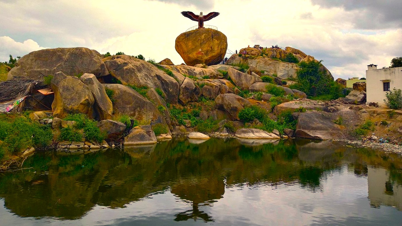 The majestic Jatayu Sculpture stands atop a rocky hill in Andhra Pradesh, India, a significant mythological attraction located near the famous Lepakshi Temple complex and its mysterious floating pillar.