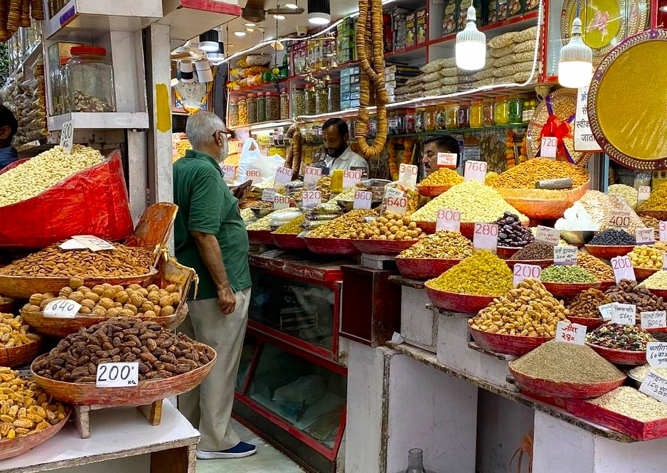 Vibrant South India spice market stall in Kerala showcases colorful dried fruits, nuts and aromatic Indian spices near iconic Kerala Folklore Museum Kochi, reflecting cultural heritage, trade and bustling commerce. Vibrant South India spice market stall in Kerala showcases colorful dried fruits, nuts and aromatic Indian spices near iconic Kerala Folklore Museum Kochi, reflecting cultural heritage, trade and bustling commerce.