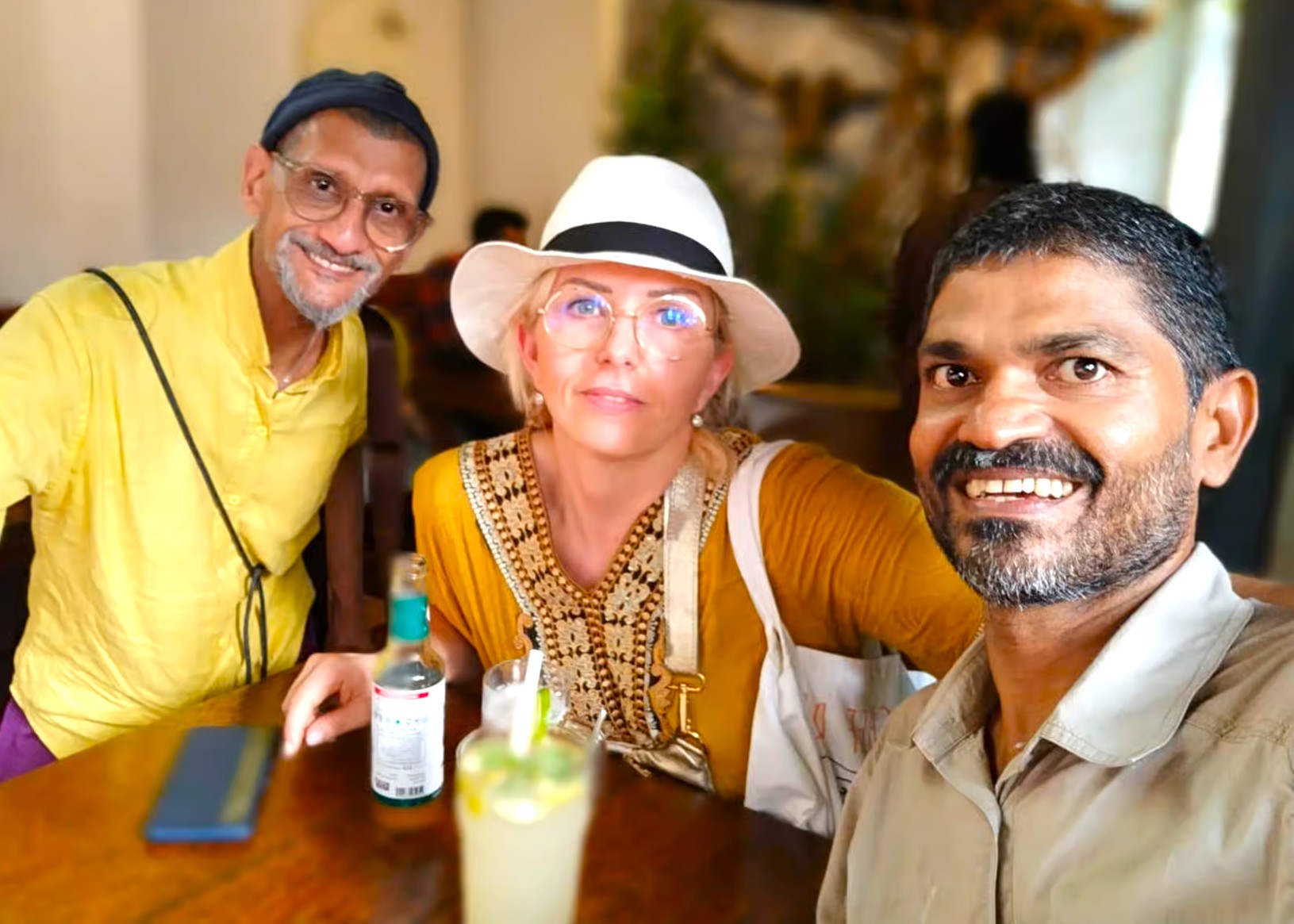 Two tourists and their local driver share a joyful moment near Kerala Folklore Museum Kochi, capturing authentic travel experiences and warm South India hospitality during their Kerala cultural adventure. Two tourists and their local driver share a joyful moment near Kerala Folklore Museum Kochi, capturing authentic travel experiences and warm South India hospitality during their Kerala cultural adventure.