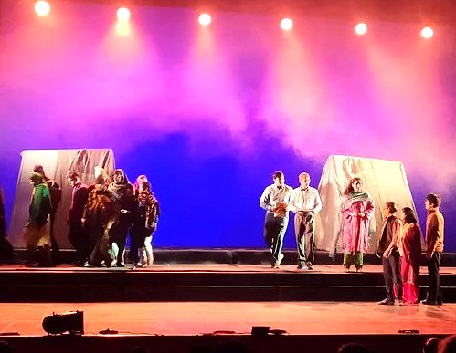 A theatrical performance unfolds on stage at the renowned Kamani Auditorium in Delhi, India, a cultural hub near historic UNESCO sites like the Red Fort, Qutb Minar, and Humayun's Tomb. A theatrical performance unfolds on stage at the renowned Kamani Auditorium in Delhi, India, a cultural hub near historic UNESCO sites like the Red Fort, Qutb Minar, and Humayun's Tomb.