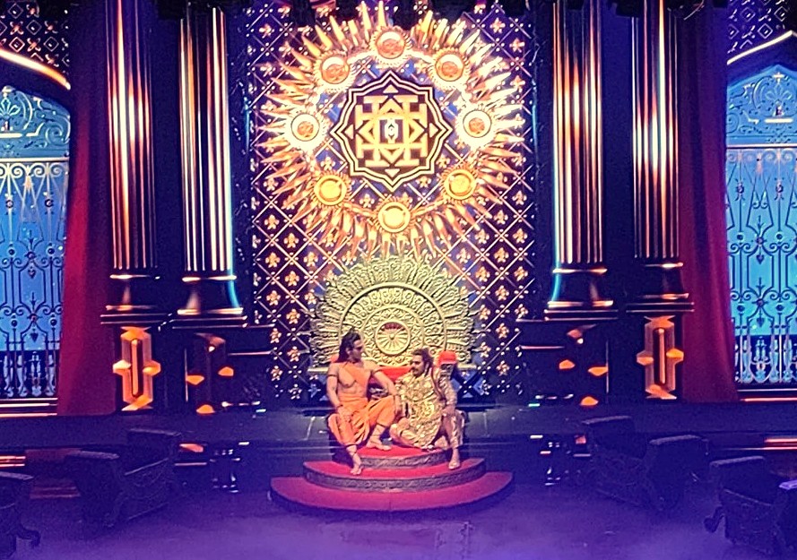 Performers on an ornate, beautifully lit stage during a cultural show at the prestigious Kamani Auditorium in Delhi, India, a major arts venue near UNESCO sites like Red Fort and Humayun's Tomb. Performers on an ornate, beautifully lit stage during a cultural show at the prestigious Kamani Auditorium in Delhi, India, a major arts venue near UNESCO sites like Red Fort and Humayun's Tomb.
