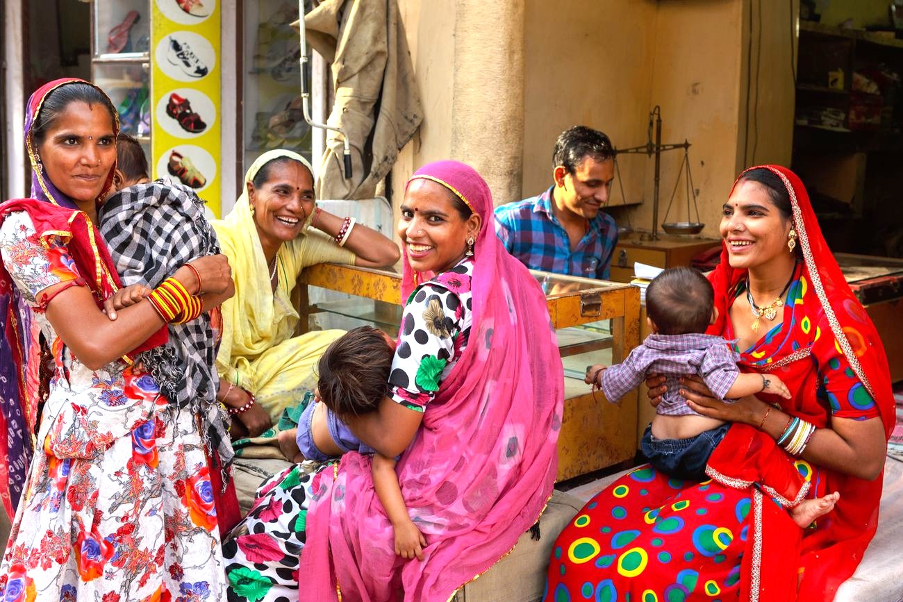 "Community gathering at Karanji Lake Mysore showcases Bangalore Karnataka families and children social interaction, vibrant market setting, rich local culture in India’s scenic lakeside hub."