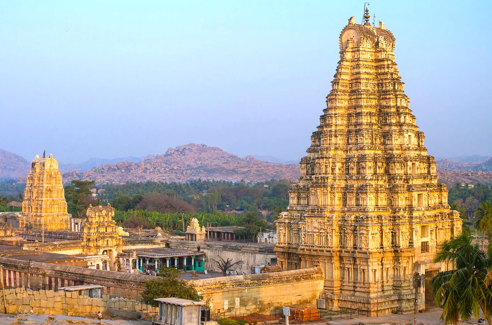 Ancient Virupaksha Temple in Hampi, Karnataka highlights South India’s majestic temple architecture, heritage and landscapes, includes Mysore palaces, Bangalore cityscape, and UNESCO world heritage significance. Ancient Virupaksha Temple in Hampi, Karnataka highlights South India’s majestic temple architecture, heritage and landscapes, includes Mysore palaces, Bangalore cityscape, and UNESCO world heritage significance.