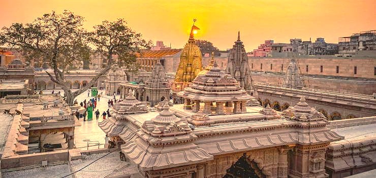 The majestic Kashi Vishwanath Temple shines at sunset in Varanasi, India, a key pilgrimage site located near the Sarnath UNESCO World Heritage Site. The majestic Kashi Vishwanath Temple shines at sunset in Varanasi, India, a key pilgrimage site located near the Sarnath UNESCO World Heritage Site.