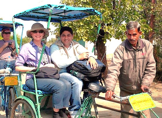 A guided rickshaw tour through Keoladeo National Park, a Unesco site, fosters a unique relationship between tourists and their local guide, a highlight for travelers in India visiting Agra, the Taj Mahal, Agra Fort, and nearby Fatehpur Sikri Fort.
