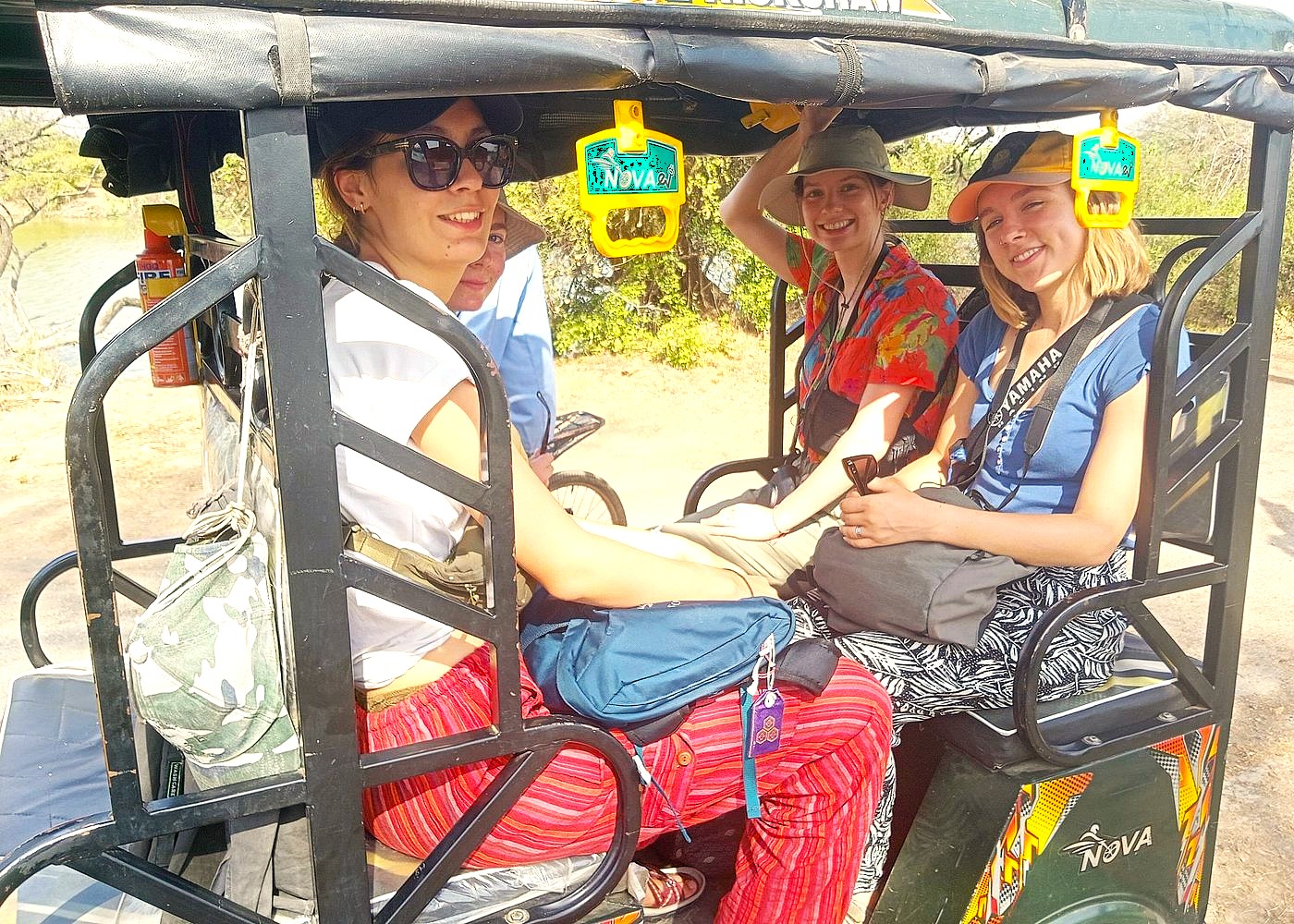 Tourists strengthen their friendly relationship on a rickshaw tour through Keoladeo National Park, a Unesco site, a popular activity for travelers in India visiting Agra, the Taj Mahal, Agra Fort, and the nearby Fatehpur Sikri Fort.