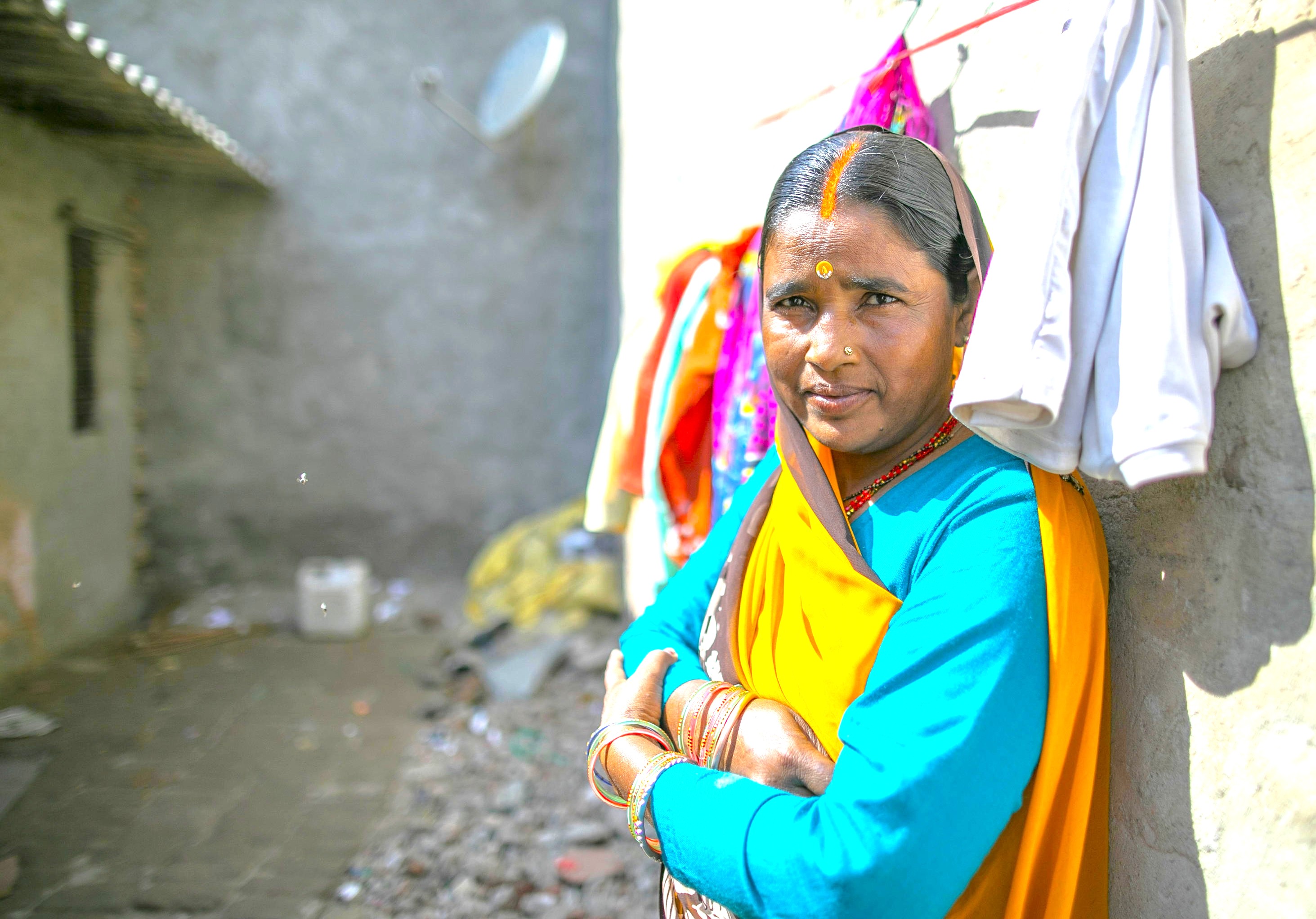 A portrait of a local woman near Koodal Aznagar Temple in Madurai, Tamil Nadu, shows the resilient relationship of the community with their environment, a powerful sight for tourists in India visiting near Meenakshi Temple before travelling to Munnar and the Unesco Western Ghats. A portrait of a local woman near Koodal Aznagar Temple in Madurai, Tamil Nadu, shows the resilient relationship of the community with their environment, a powerful sight for tourists in India visiting near Meenakshi Temple before travelling to Munnar and the Unesco Western Ghats.