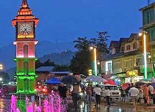 The Lal Chowk clock tower is illuminated in national colors during celebrations, a central civic and UNESCO Creative Arts site in Srinagar, Jammu and Kashmir, India. The Lal Chowk clock tower is illuminated in national colors during celebrations, a central civic and UNESCO Creative Arts site in Srinagar, Jammu and Kashmir, India.