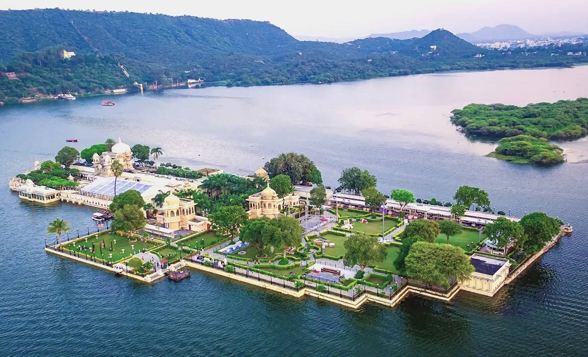 Experience a serene Shikara boat tour on Lake Pichola in Udaipur, Rajasthan, India, surrounded by historic palaces, lush gardens, and majestic Aravalli hills, showcasing royal architecture and romantic heritage vistas. Experience a serene Shikara boat tour on Lake Pichola in Udaipur, Rajasthan, India, surrounded by historic palaces, lush gardens, and majestic Aravalli hills, showcasing royal architecture and romantic heritage vistas.