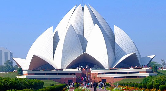 Visitors admire the Lotus Temple’s iconic white marble petals, serene gardens, an architectural marvel in New Delhi, India, blending modern design, spiritual ambiance, lush landscaping, elegant symmetry and tranquil atmosphere.  Visitors admire the Lotus Temple’s iconic white marble petals, serene gardens, an architectural marvel in New Delhi, India, blending modern design, spiritual ambiance, lush landscaping, elegant symmetry and tranquil atmosphere.