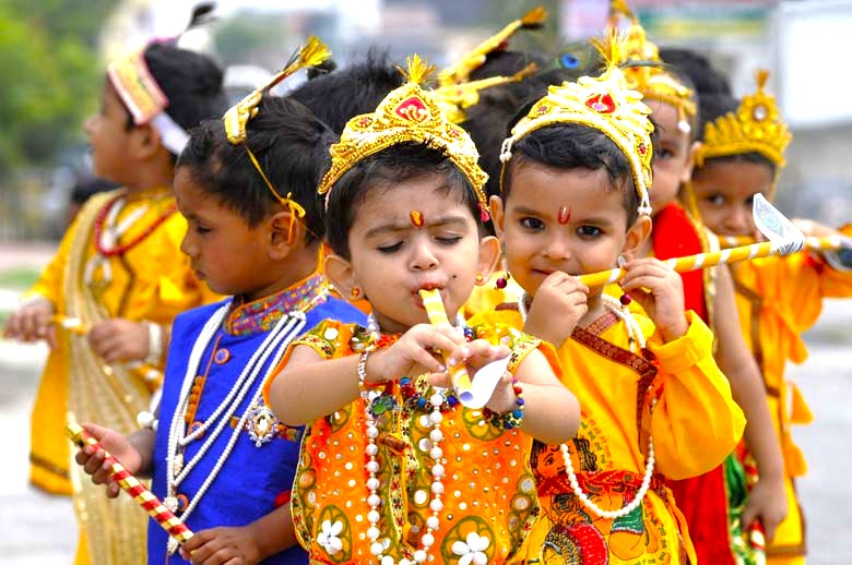 Colorful Indian children in traditional attire play flutes during a vibrant cultural festival near the iconic Lotus Temple in New Delhi, India, showcasing joyous community participation, heritage celebration, musical traditions. Colorful Indian children in traditional attire play flutes during a vibrant cultural festival near the iconic Lotus Temple in New Delhi, India, showcasing joyous community participation, heritage celebration, musical traditions.
