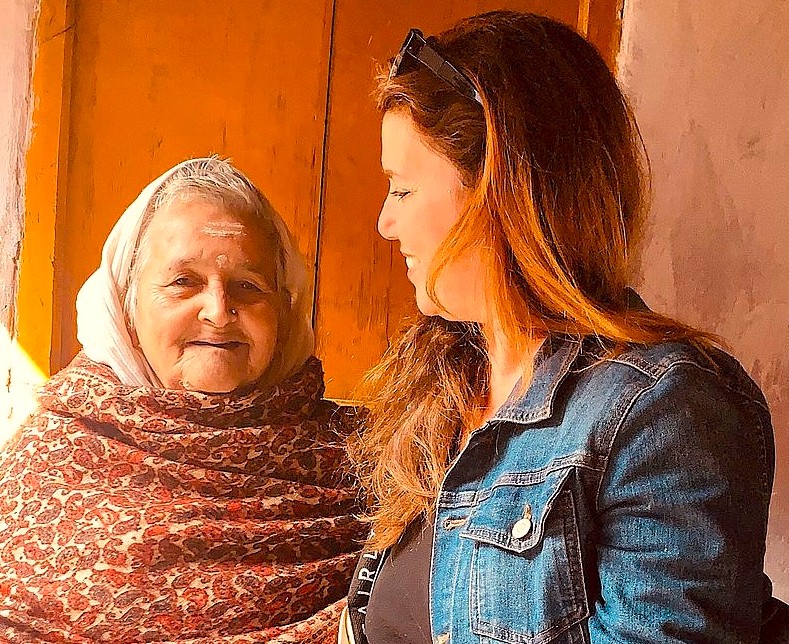 A traveler forms a warm relationship with a local woman in Maharashtra state, India, a human connection as meaningful as seeing Mumbai, the Elephanta Caves, Ellora, and the UNESCO Ajanta Caves. A traveler forms a warm relationship with a local woman in Maharashtra state, India, a human connection as meaningful as seeing Mumbai, the Elephanta Caves, Ellora, and the UNESCO Ajanta Caves.