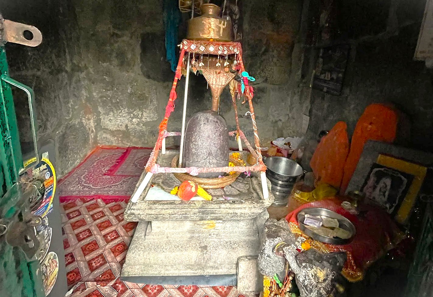 The ancient Shiva Linga within Mamleshwara Temple, Pahalgam, a key spiritual site near the Lidder River, reflecting the historical reverence for Lord Shiva in Jammu and Kashmir, India. The ancient Shiva Linga within Mamleshwara Temple, Pahalgam, a key spiritual site near the Lidder River, reflecting the historical reverence for Lord Shiva in Jammu and Kashmir, India.
